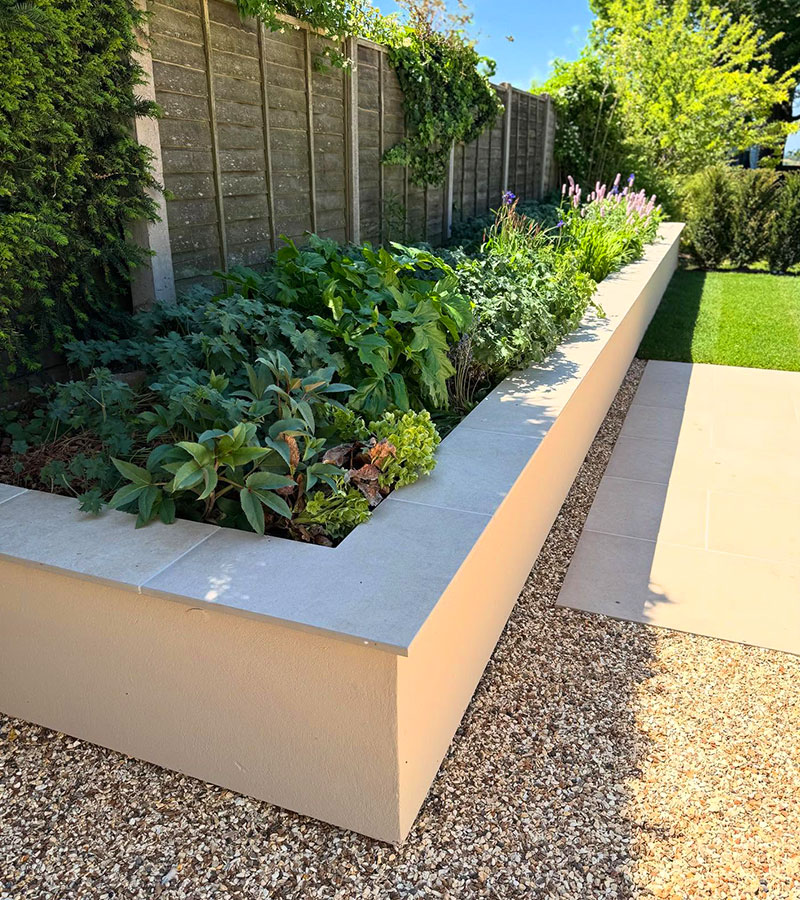 https://craftlandscapes.co.uk/wp-content/uploads/2025/09/Raised-beds-and-Borders-craft-landscapes.jpg